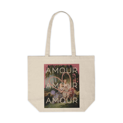 Natural canvas tote featuring a bold LGBTQ reinterpretation of Boucher's 'The Love Letter': vibrant paint splashes surround women in affection, giant heart symbolizes universality. 'Amour' echoes inclusivity, affirming diverse love stories of pride.
