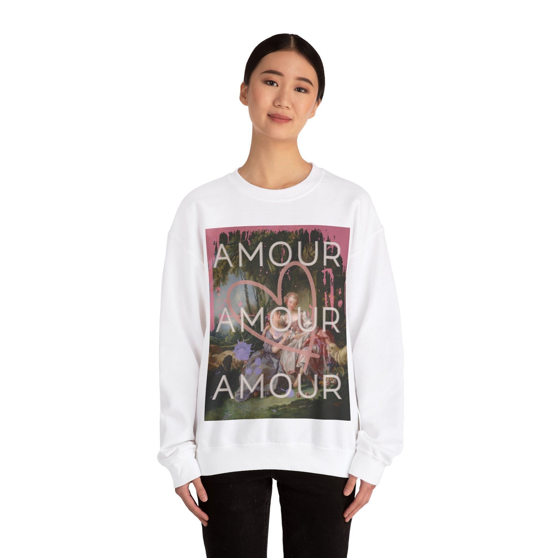 White crewneck sweatshirt featuring a bold LGBTQ reinterpretation of Boucher's 'The Love Letter': vibrant paint splashes surround women in affection, giant heart symbolizes universality. 'Amour' echoes inclusivity, affirming diverse love stories of pride.