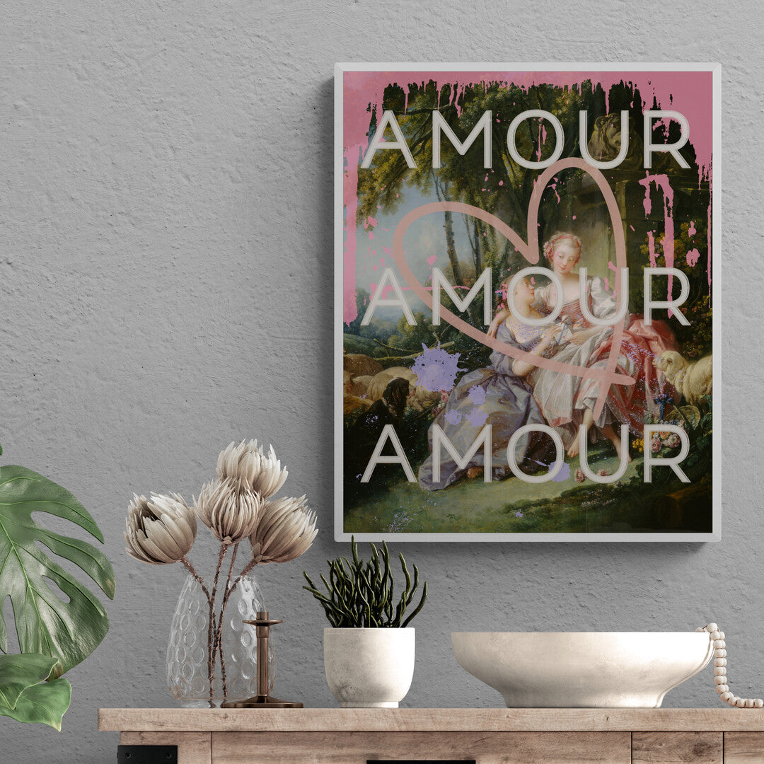 Lifestyle image of white framed satin poster featuring a bold LGBTQ reinterpretation of Boucher's 'The Love Letter': vibrant paint splashes surround women in affection, giant heart symbolizes universality. 'Amour' echoes inclusivity, affirming diverse love stories of pride.